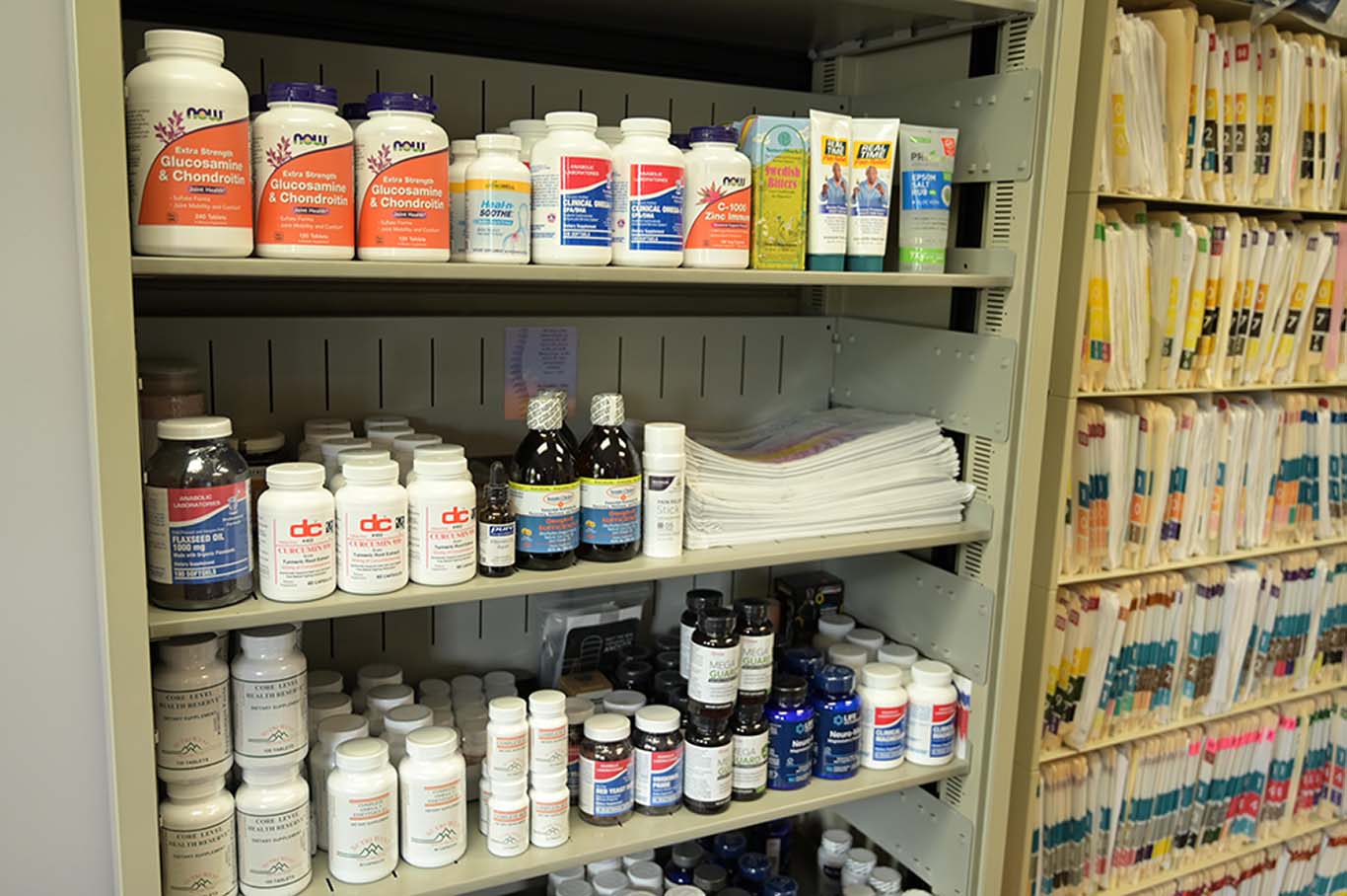 A shelf of medication and supplements